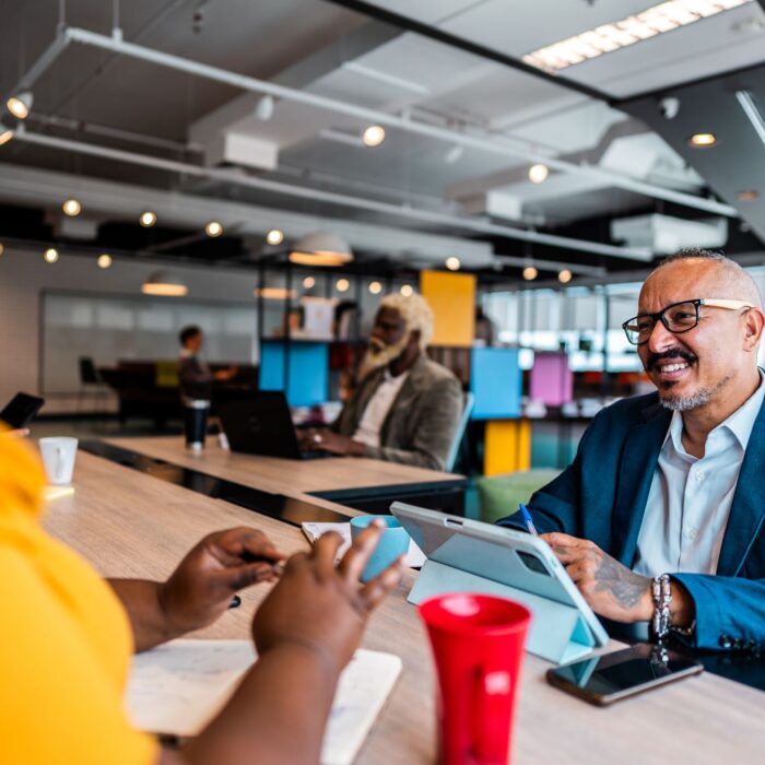 Two people talking in an office